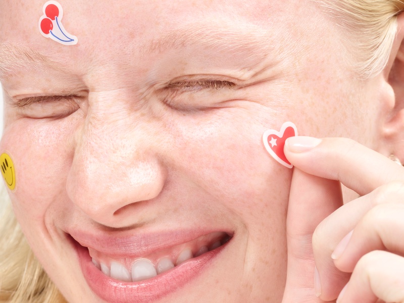 The pimple patch designs are based on Glossier's emoji sticker sheets