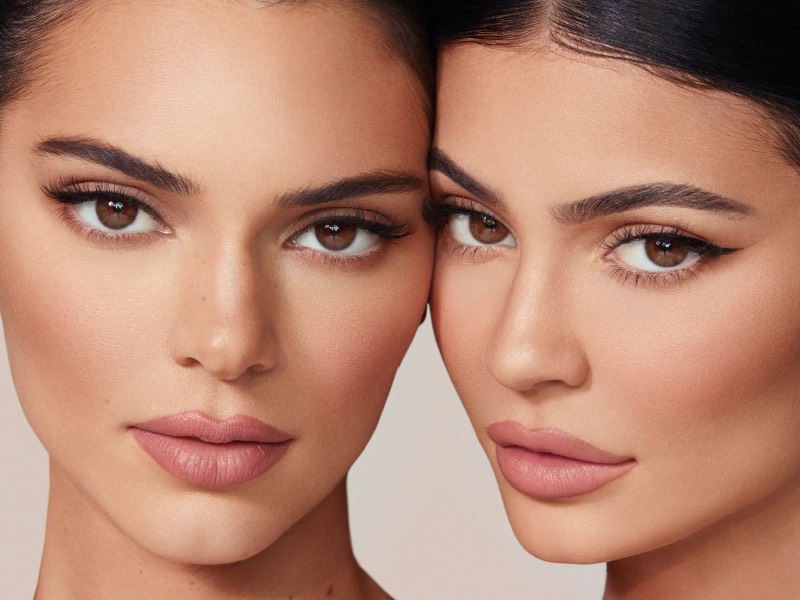 Kylie Jenner (right) pictured with sister Kendall (left) for Kylie Cosmetics' latest beauty launch