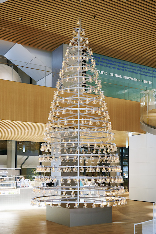 Shiseido lights up Christmas tree made of glass flasks in Japan