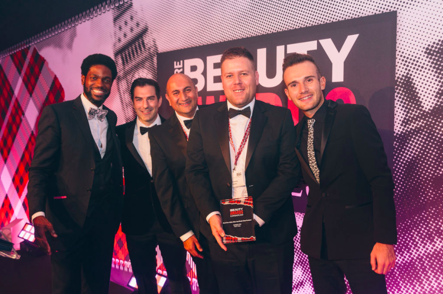 John Toner (second left) joined Layne to present an award at the 2019 event