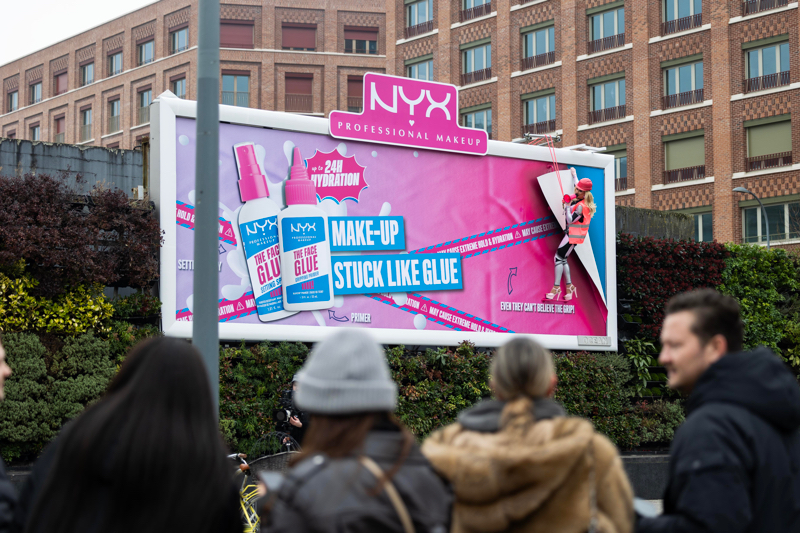 NYX ‘glues’ drag queen to billboard in guerilla primer promotion